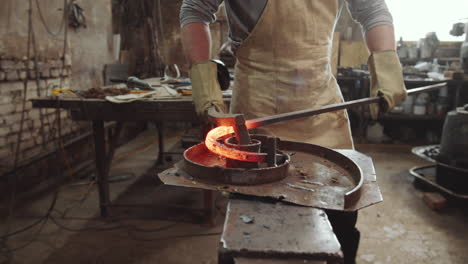 Blacksmith-Forging-Steel-Rod-into-Spiral